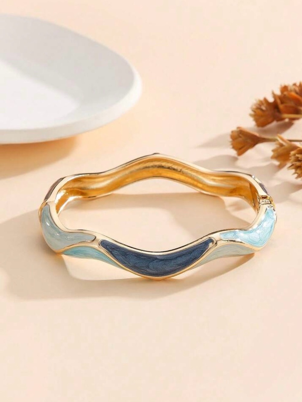 Gold-Tone Wave Bangle Bracelet with Blue Enamel Accents